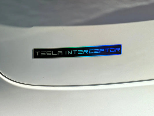 Tesla Interceptor logo on a car's surface