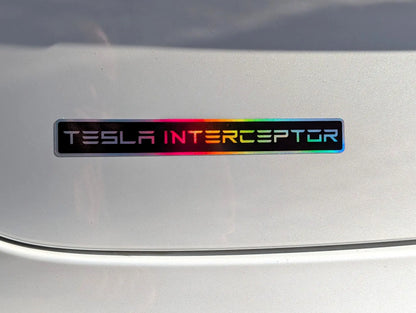 TeslaInterceptor logo on a car's metallic surface